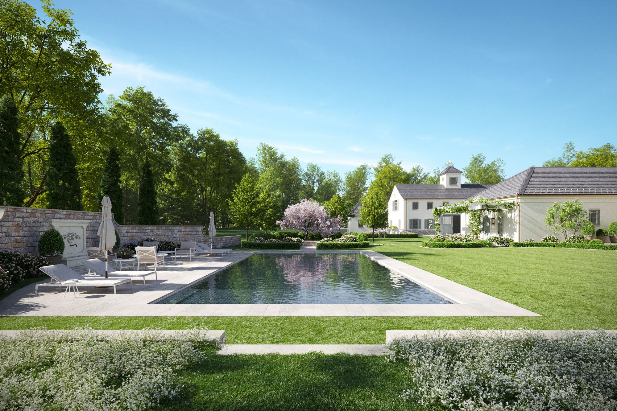 Walled pool garden beside a country house